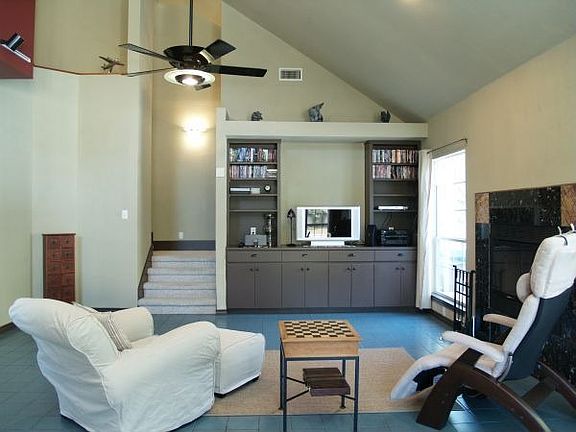 Great Built-Ins and Beautiful Earthtones Highlight the Living Room.
