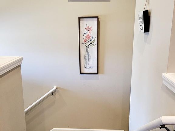 Steps up to the first floor and down to the lower floor