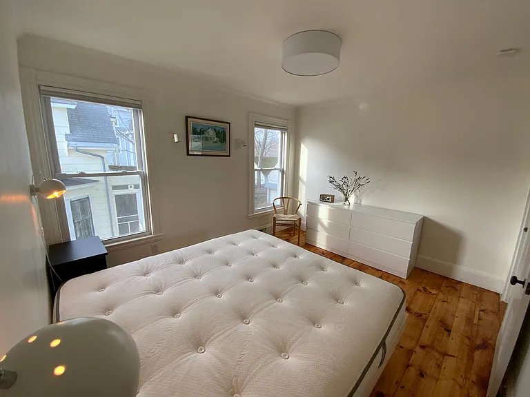 Primary bedroom with organic king mattress by Avocado.