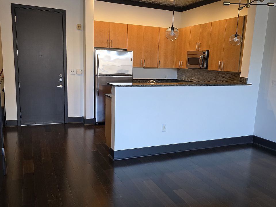 Entrance into the condo and open kitchen