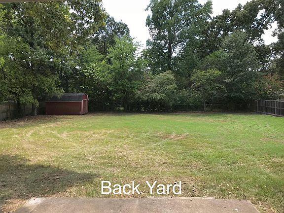 Large and private back yard, includes, patio,16x10 storage building and fence