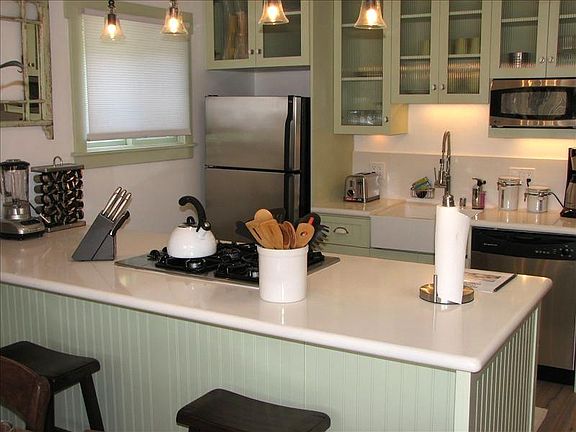 kitchen island and farmhouse sink