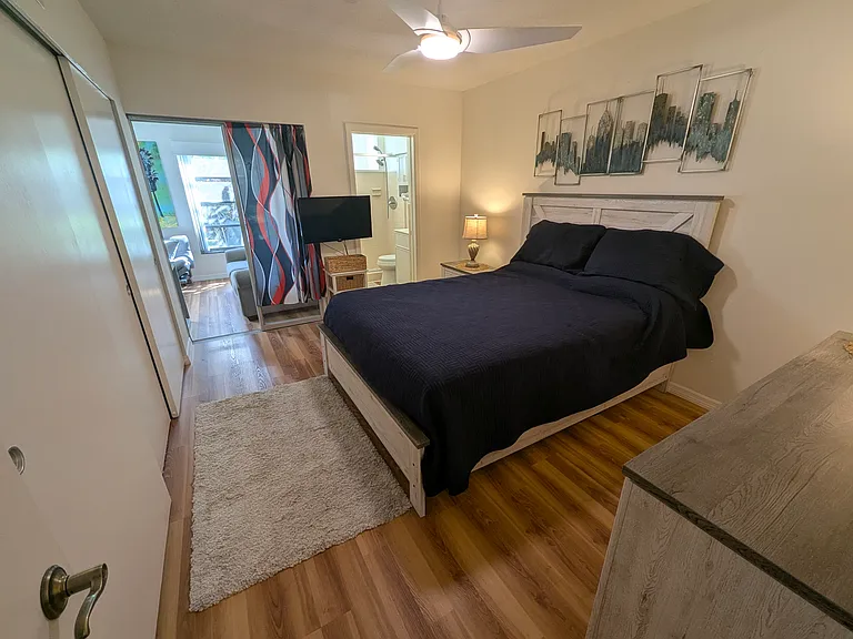 Master bedroom with brand new queen mattress and bedroom furniture