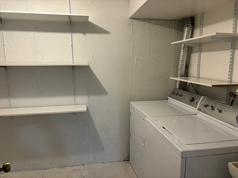 Lower Level in unit laundry with storage