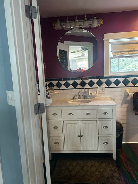 Large bathroom with walk in shower.