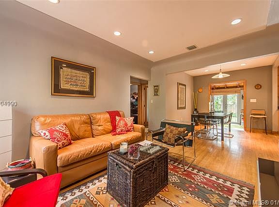 Charming bungalow on a quiet, tree-lined, cul-de-sac street in prestigious North Coconut Grove