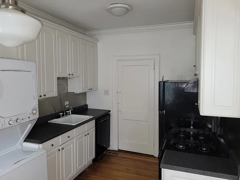 Kitchen. Farmhouse sink. Gas stove. Stacked Wash/Gas Dryer. Disposal Dishwasher. GE Appliances