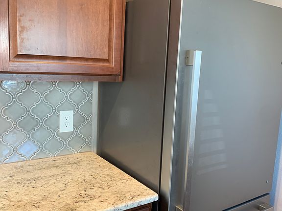 New stainless steel refrigerator/freezer