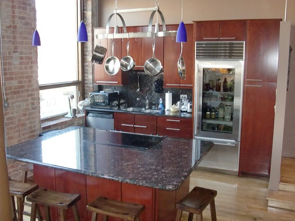 Granite countertops, Subzero refrigerator, seating for 7