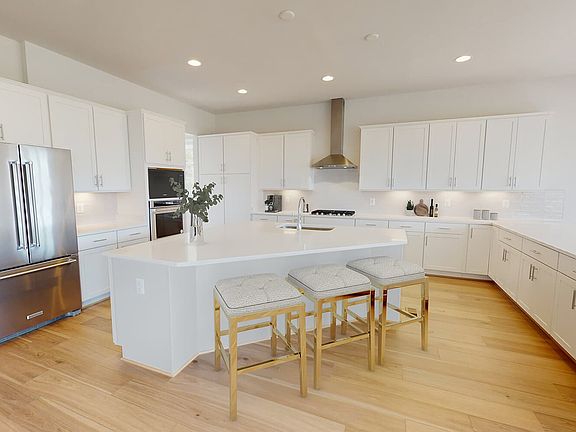 The kitchen of the Hadleigh by Brookfield Residential at Waterford Manor