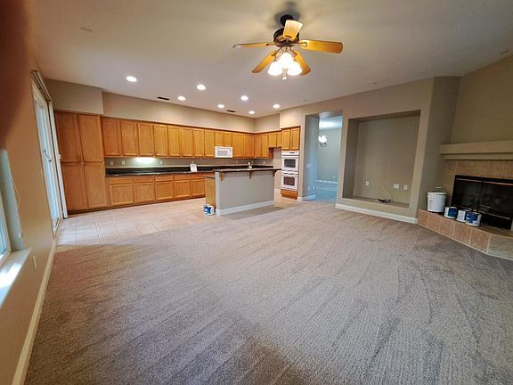 Spacious great room and kitchen with ample storage and counter space. Granite Countertops.