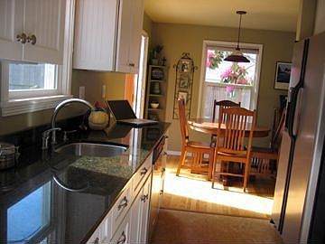 new slab granite kitchen