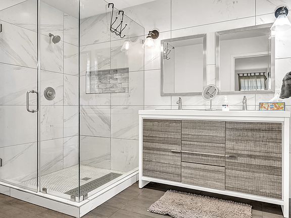 Enjoy a shower in the primary bedroom