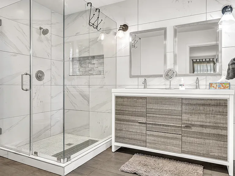 Enjoy a shower in the primary bedroom