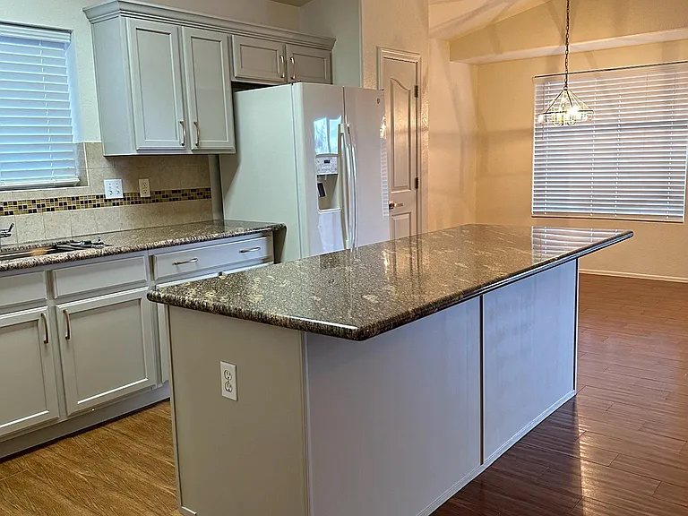 Kitchen with refinished cabinets