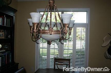 Chandelier
						:
						Very expensive chandelier. Plantation shutters.