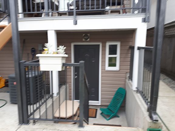 Separate Covered patio and entrance to 1 Br unit