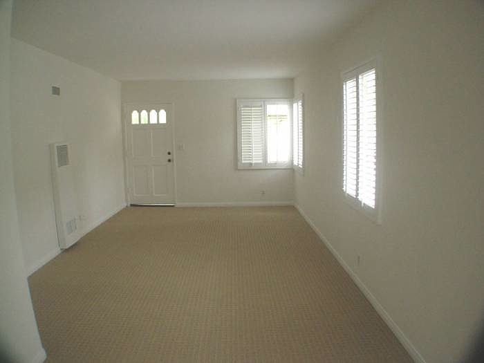 Living Room has wood shutters