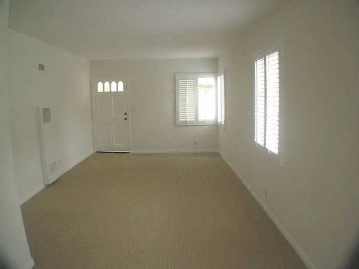 Living Room has wood shutters