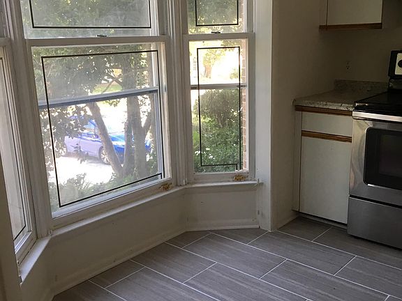 Brand new porcelain tiled kitchen