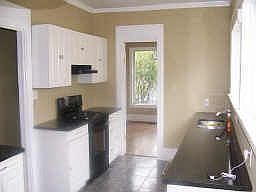 Modern Kitchen Features: Granite C'top, Tiled Floors and etc