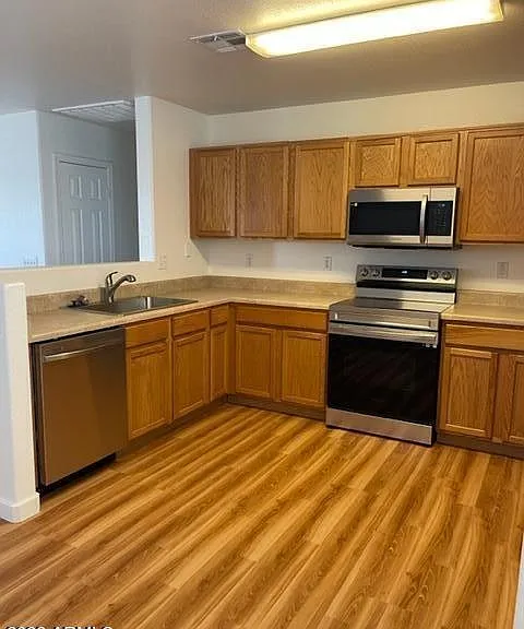 Kitchen with all new appliances and new sink and garbage discposal