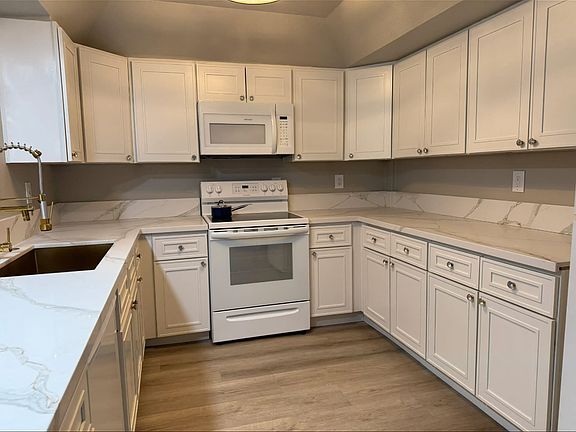 Kitchen with all new appliances, countertops, cabinets etc.