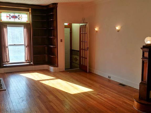 Warm hardwoods in the living room on a sunny afternoon