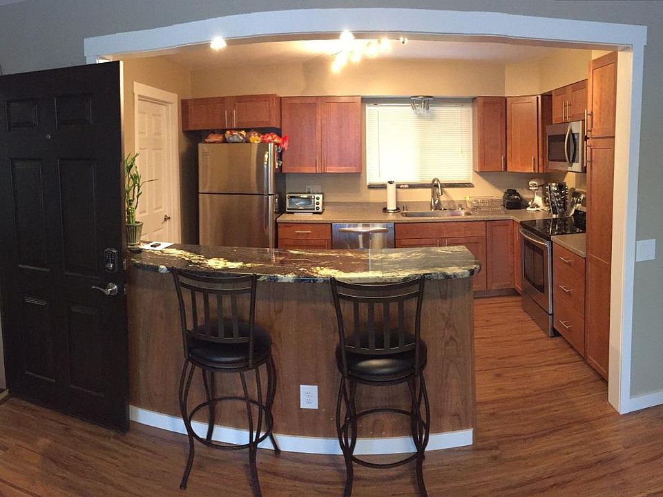 granite bar top cherry cabinets