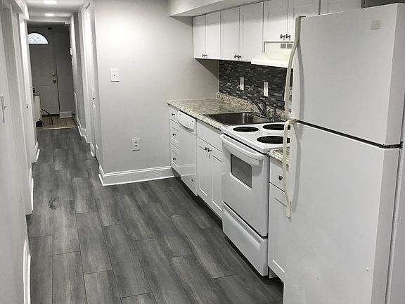 Kitchen and hallway; new induction stove not pictured