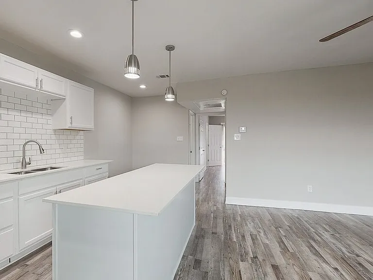 Stunning kitchen with subway tile backsplash and quartz countertops