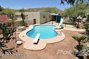 Pool with diving board and Slide