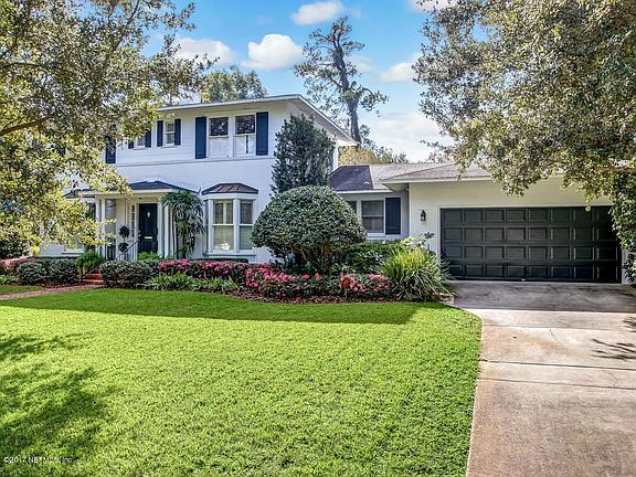 Lush Lawn and Attached Garage!
