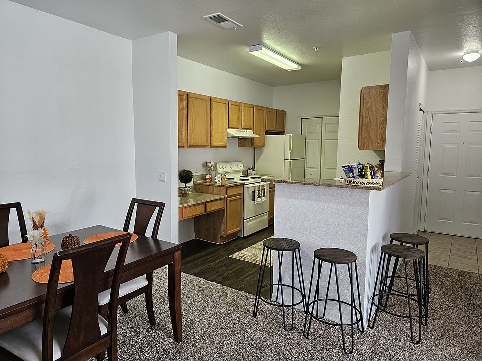 Modern kitchen with ample counter space, quality appliances, and a spacious pantry for convenient storage and organization.