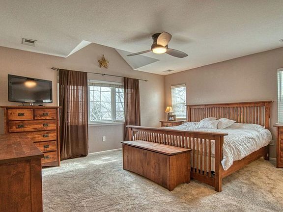 Second floor large master bedroom with full bath, two additional bedrooms and one additional full bath.