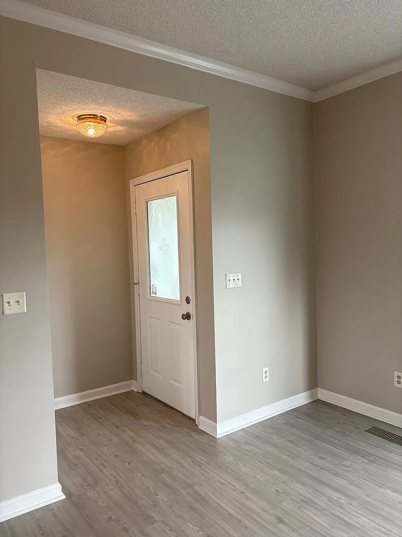 Spacious Brick Home with Fenced-In Back Yard! — Photo 3