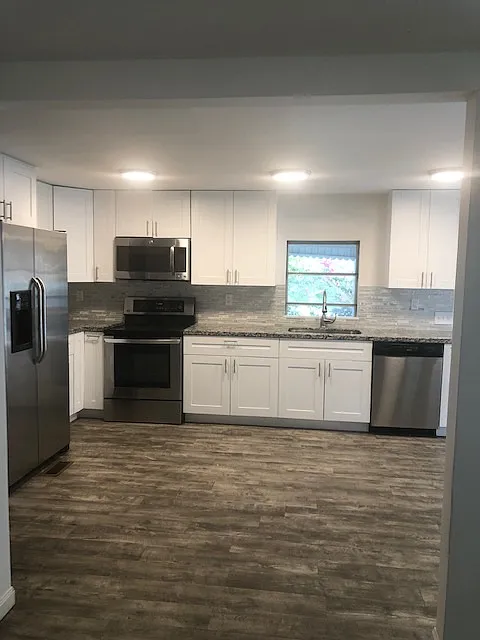 Countryside community grounded mobile home. Covered parking. Newly renovated 2 plus bedrooms, 2 bathrooms. Lake view. Nice backyard. Close to main road. - 21501 NW 7th St #21501