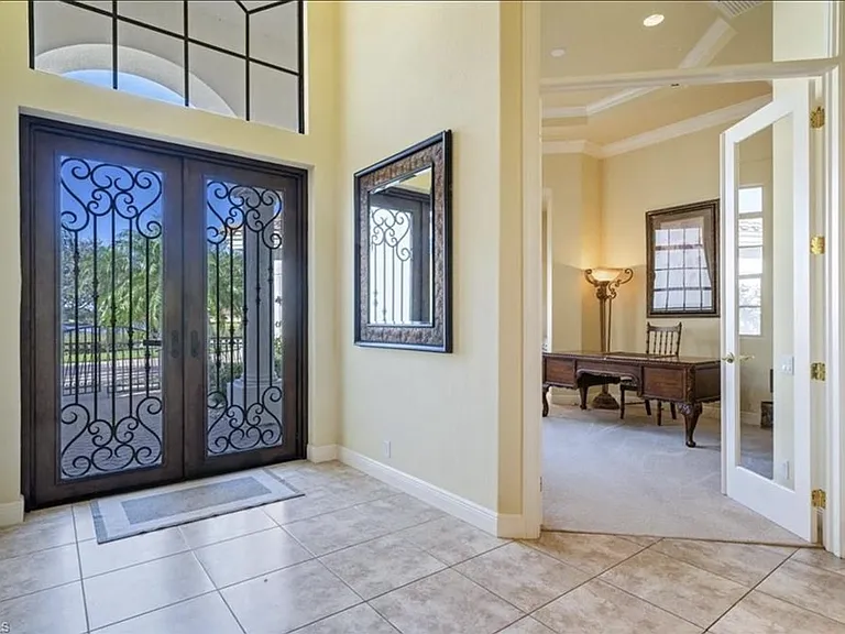 Den is to the left of entrance