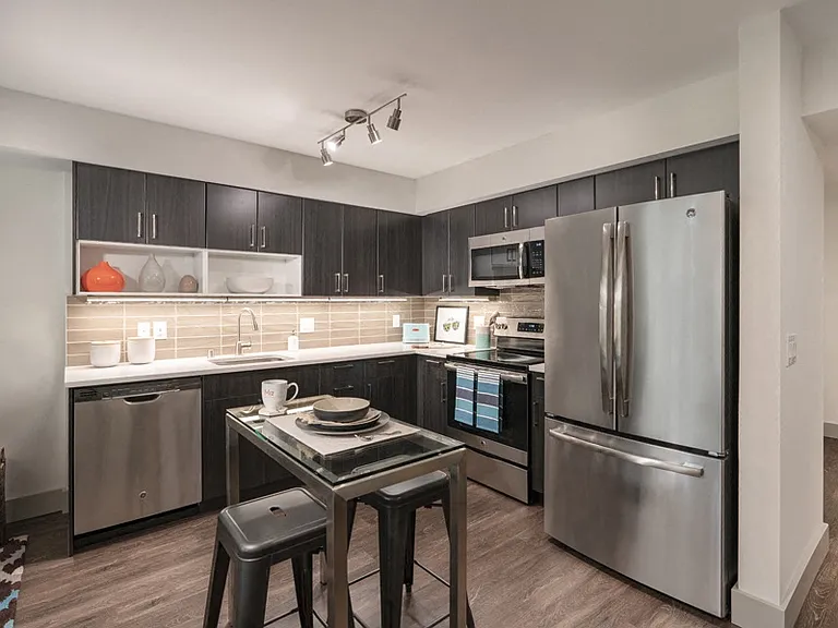 South Building apartments equipped with premium quartz countertops, onyx-finish cabinets and modern lighting