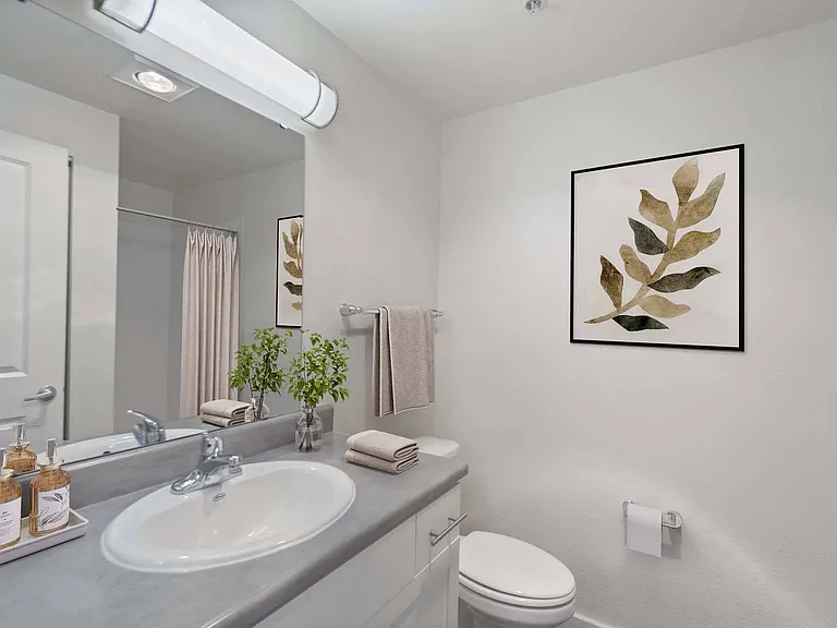 Relax and refresh in this beautifully designed bathroom, where comfort meets style