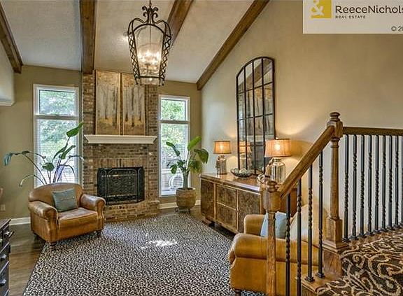 Great Room Staircase with Iron Spindles & Designer Carpet!