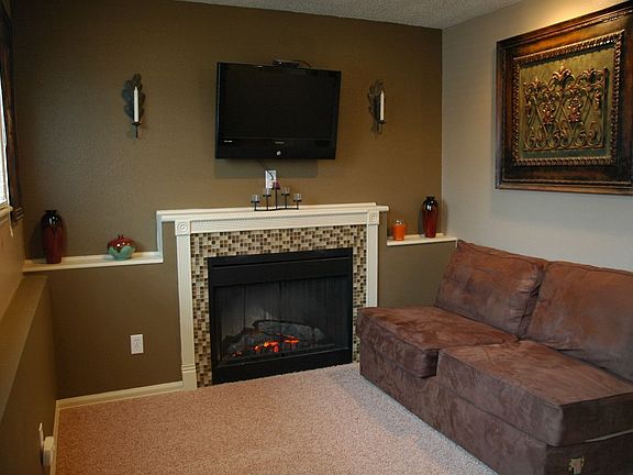 Custom Tile Surround Fireplace in Family Room