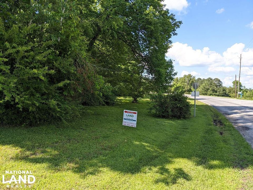 Paved road frontage to farmhouse.