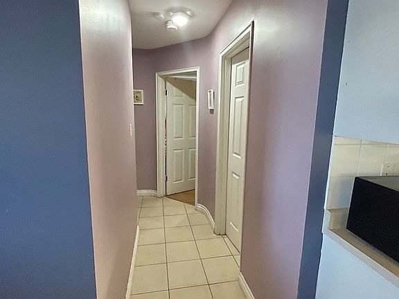 5th image of 9050 Wyandotte St E Unit 204