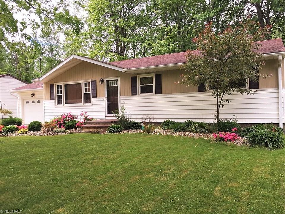 Vinyl and wood sided 3 bedroom ranch beautifully landscaped