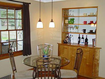 Here is a nice eating area with pendant lighting.