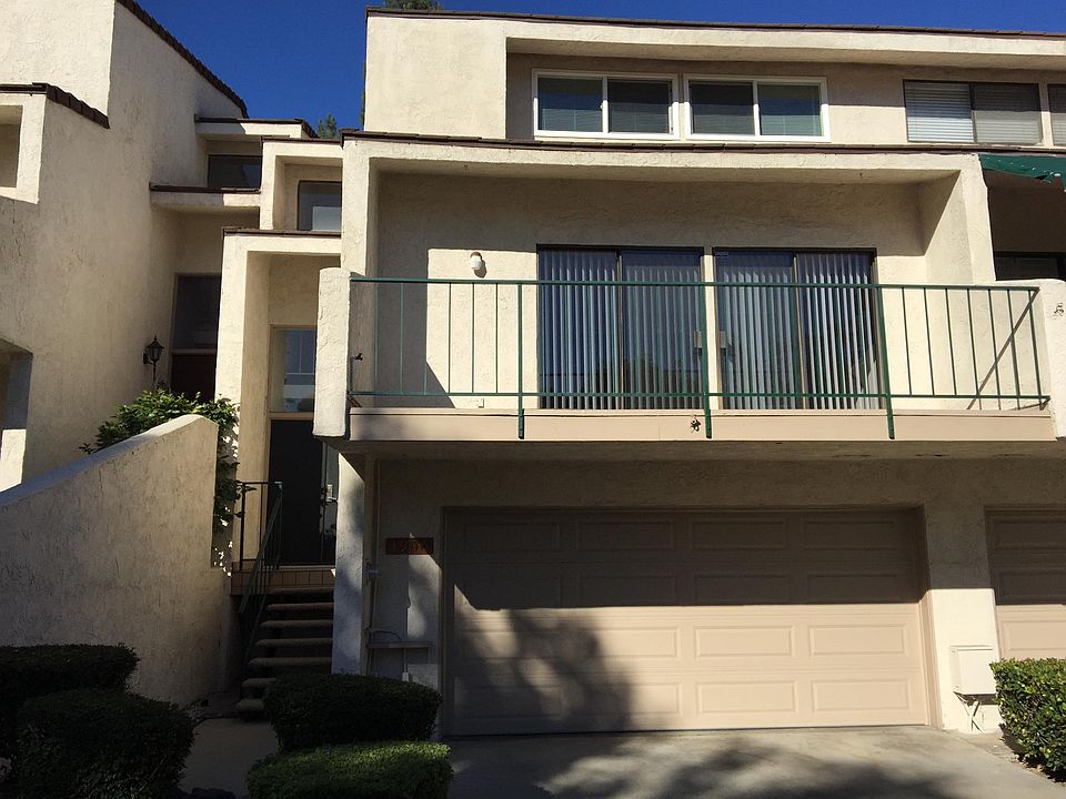Front of Home, 2-Car Attached Garage and View Balcony