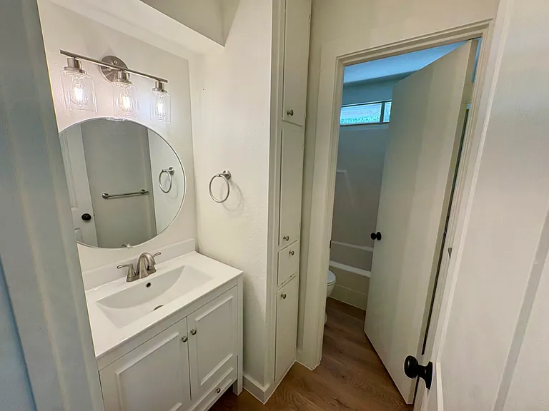Upstairs full bathroom, new sink, new vanity, new toilet