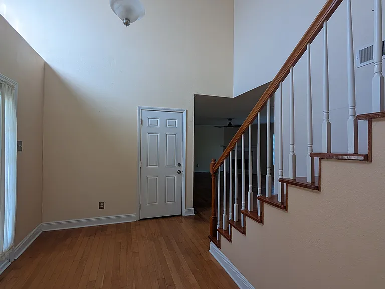 Foyer, facing family room and garage door