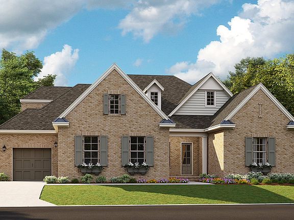 Santa Fe B - English Cottage 3-Car Side Load Garage Note Renderings may show optional features